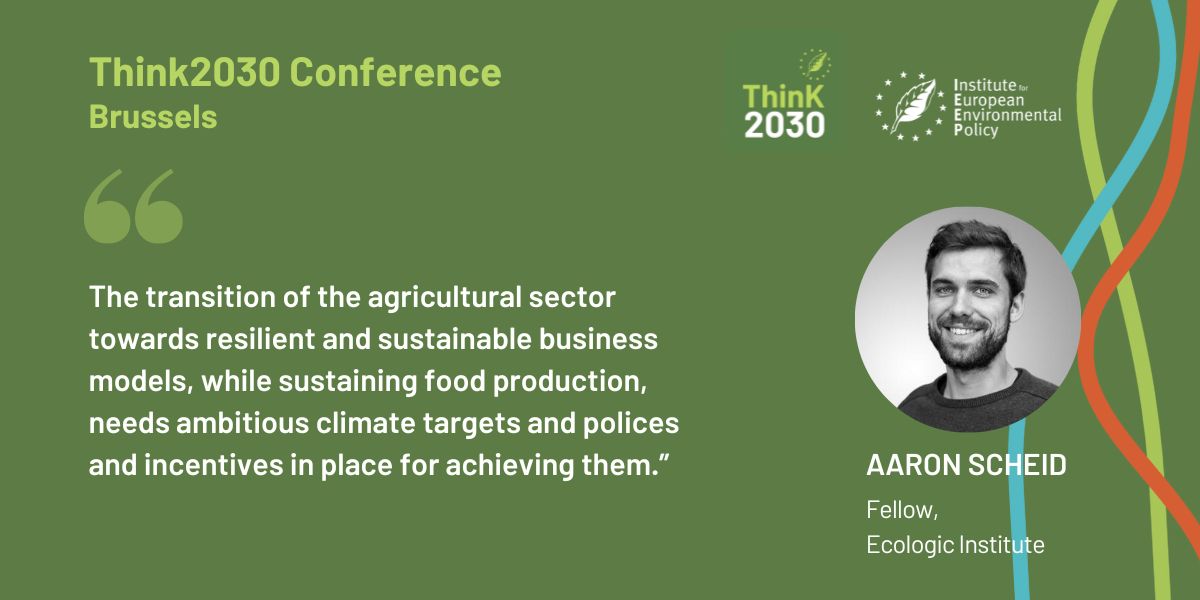 Graphic for the Think2030 Conference in Brussels featuring a quote from Aaron Scheid, a Fellow at the Ecologic Institute. The quote reads: 'The transition of the agricultural sector towards resilient and sustainable business models, while sustaining food production, needs ambitious climate targets and policies and incentives in place for achieving them.' Aaron Scheid is shown in a portrait next to the text, set against an olive green background with decorative wavy lines in blue, red, and green.
