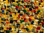 Many Lego figures in a lecture hall