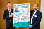 The managing directors of RELAW GmbH, Dr. iur. Martin Winkler and Dipl.-Wi.-Ing. Sönke Dibbern present a sketchnote presentation of the clearing house