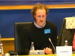 Hugh McDonald presenting at EU Parliament, screengrab