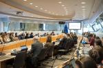 Participants attending a policy workshop at the European Parliament in Brussels, discussing EU environmental policy and biodiversity protection.
